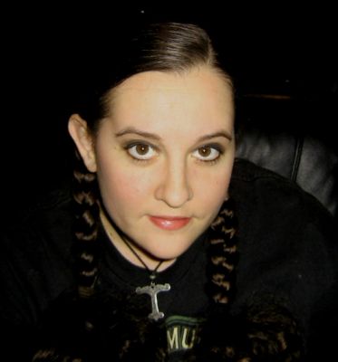 Pigtails
In Louisiana. July 2009. That's an Irminsul pendant.
